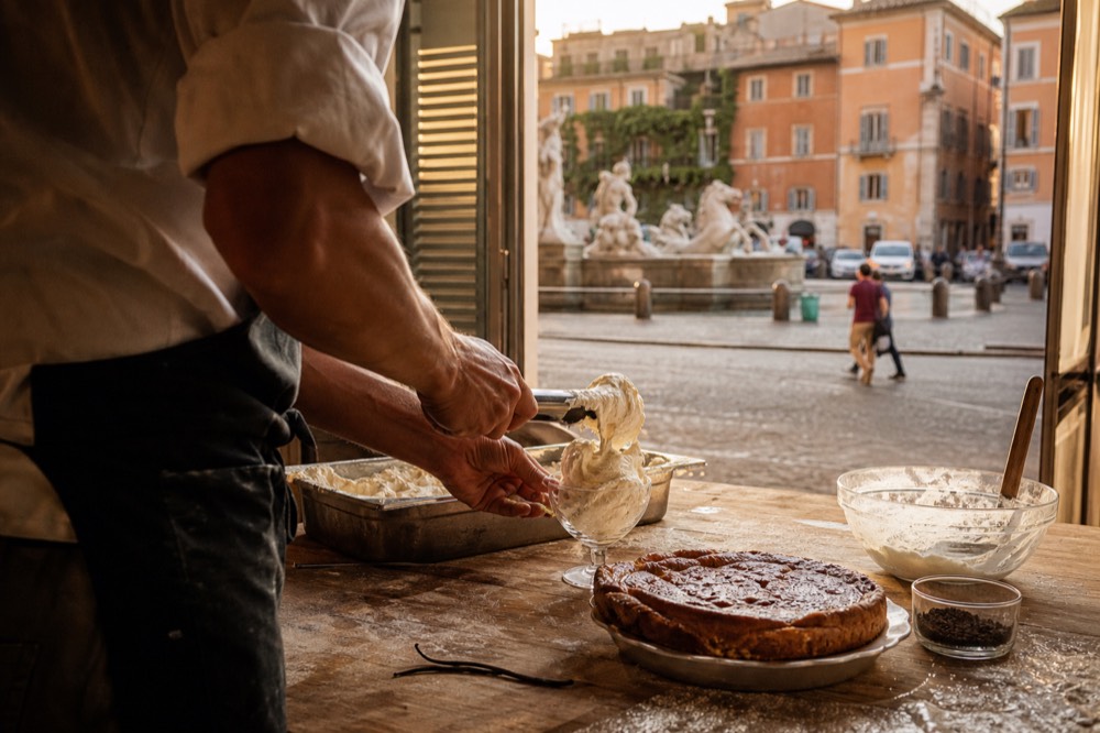 Freshly made gelato and dessert being finished in a Rome cooking class kitchen