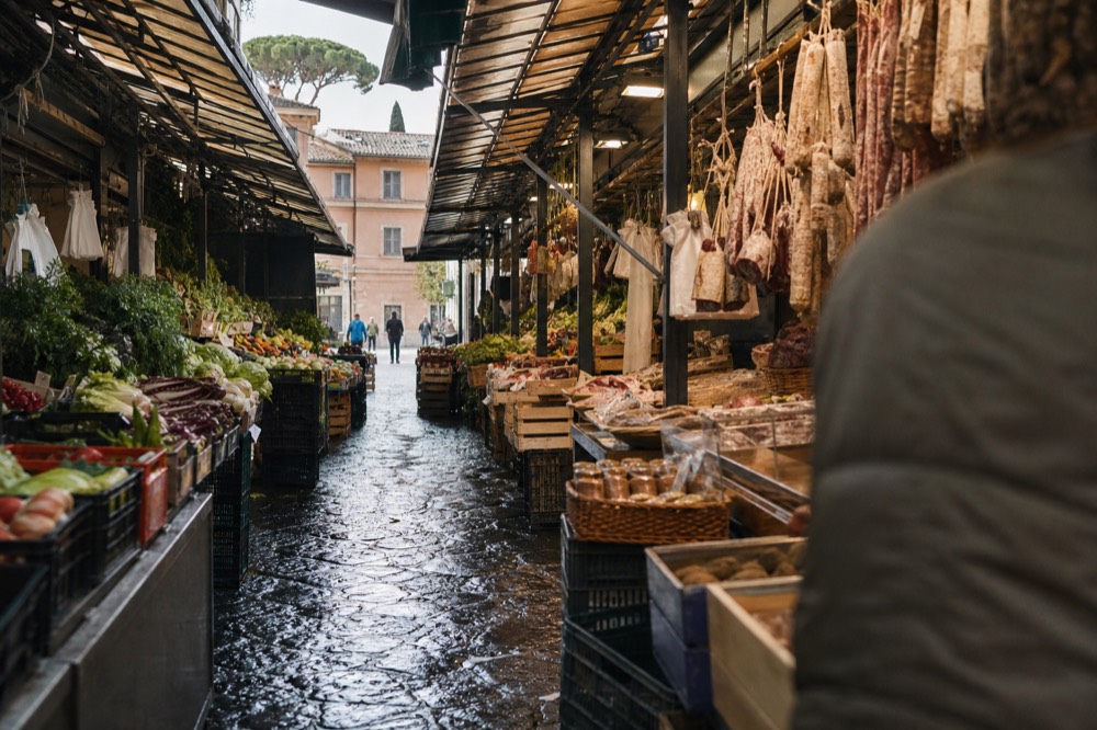 A market lane in Testaccio with food stalls on both sides